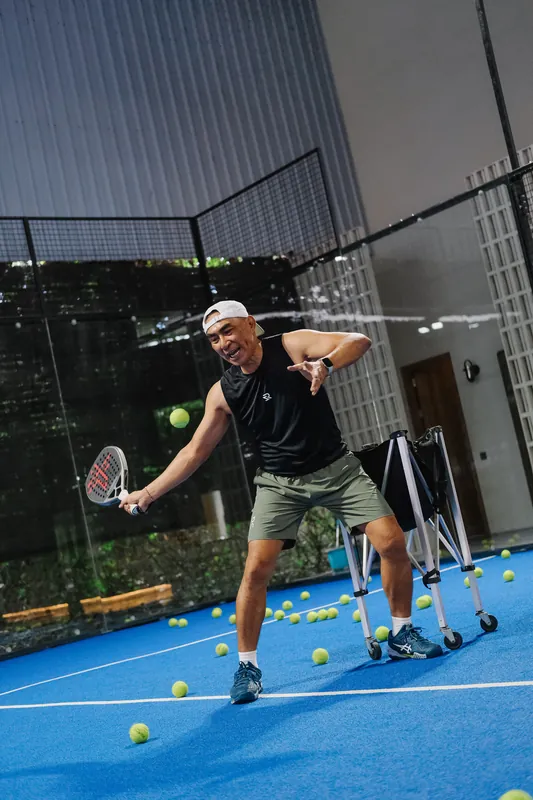 Coach Toni hitting a volley